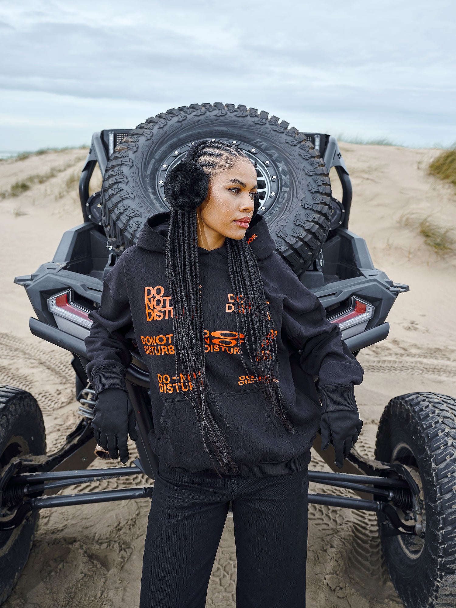 Groven Oversized Hoodie Black from the 'Do Not Disturb' collection, designed for comfort and relaxation, set against a serene background, symbolizing a break from the fast-paced world.