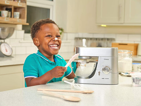 Child playing with Casdon Kenwood Mixer - a great baking gift