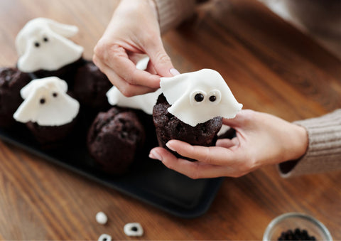 Ghosty Muffins being decorated - Halloween bakes perfect for a party