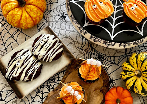 Creepy Mummy Cookies amongst other Halloween bakes perfect for a party