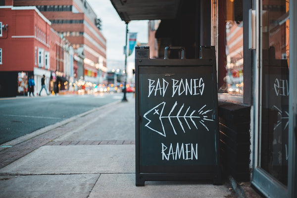a chalkboard sign is great for restaurants to drive traffic