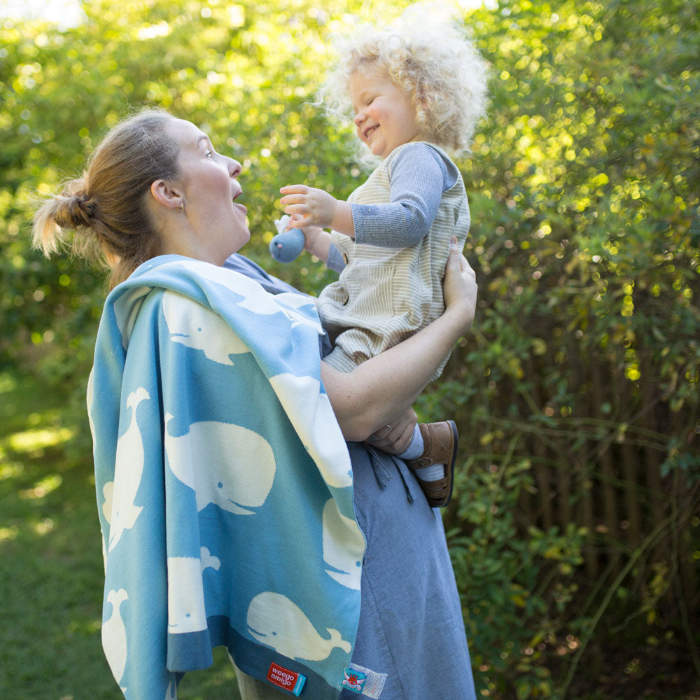 Baby and mum having a fun journey outside with a Journee Cotton Knit Baby Blanket Noah