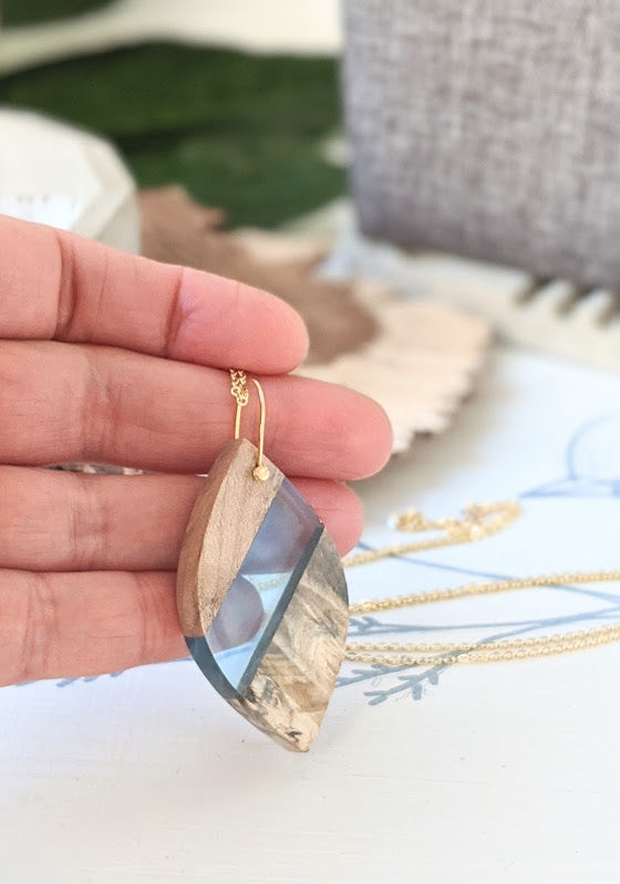 Clear Blue Almond Shaped Wood and Resin Necklace