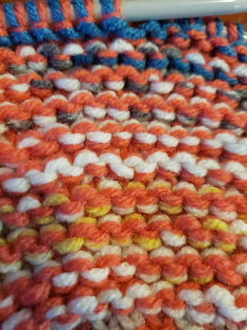 Flat knitting on knitting