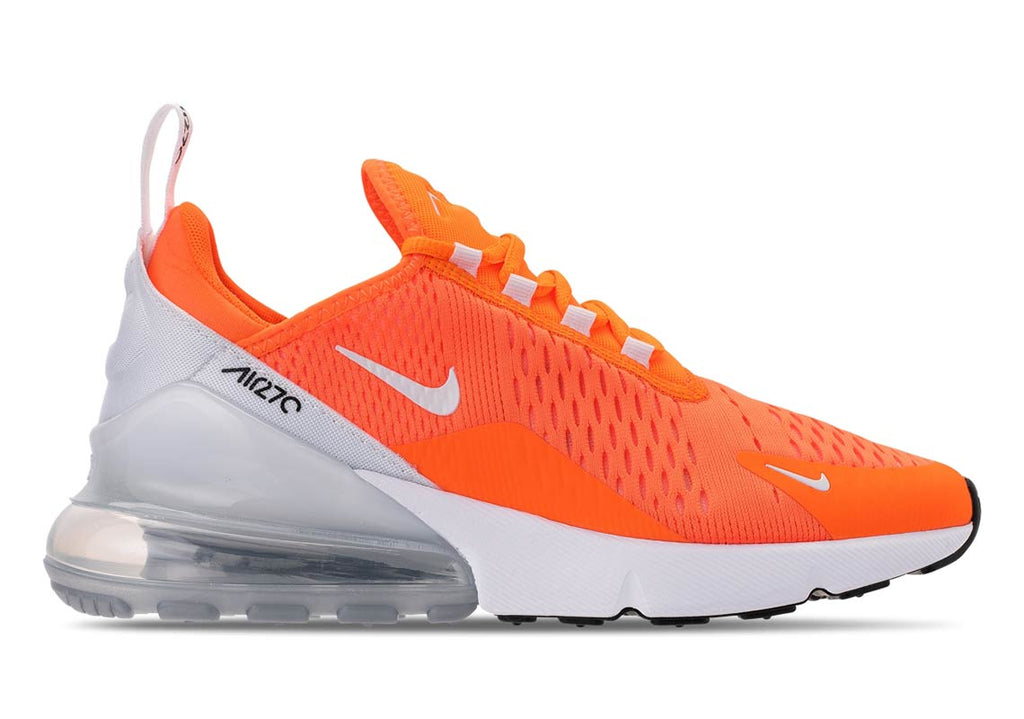 orange nike running shoes