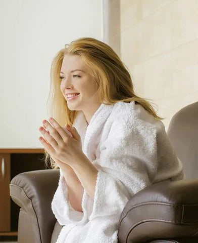 Women in hotel bathrobe