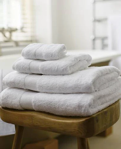 Towels on a wooden stool
