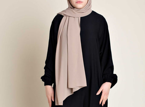 Model wearing a Neutral Chiffon Hijab from Momina Hijabs