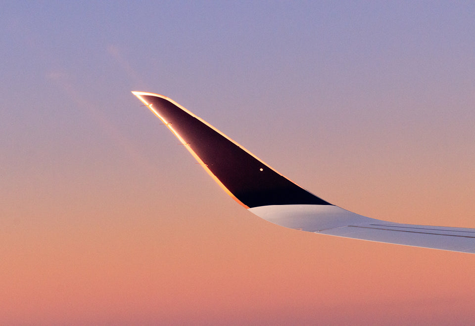 Singapore Airlines Plane Wing In Sunset