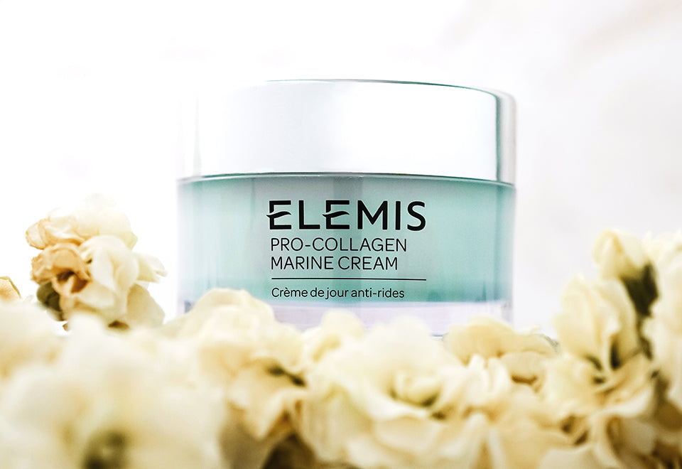 Elemis Pro Collagen Marine Cream On Bed Of Yellow Flowers