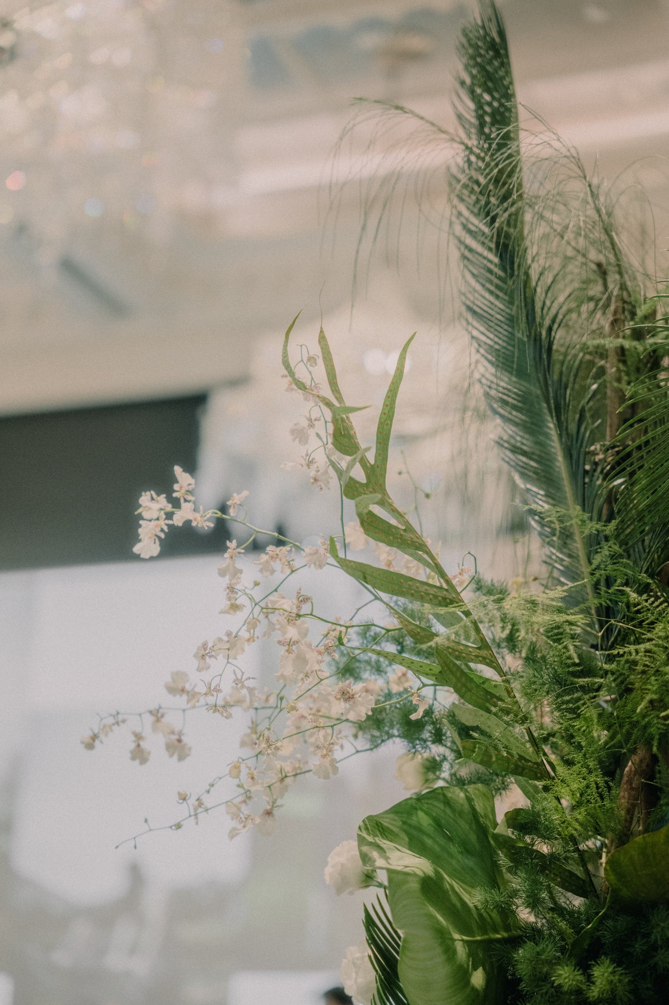 botanical tropical backdrop for green wedding lunch reception at raffles hotel singapore 15