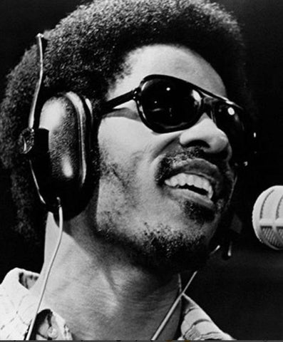 Stevie Wonder wearing Black avaitor style eyewear.
