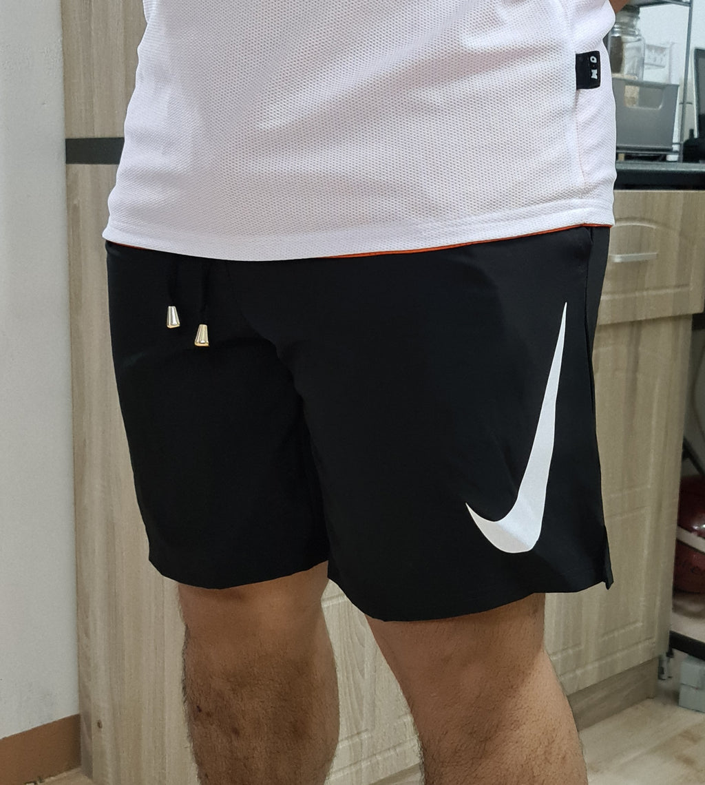 nike taslan short price