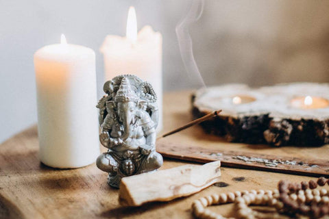 candles are key for creating zen vibes in your yoga room at home