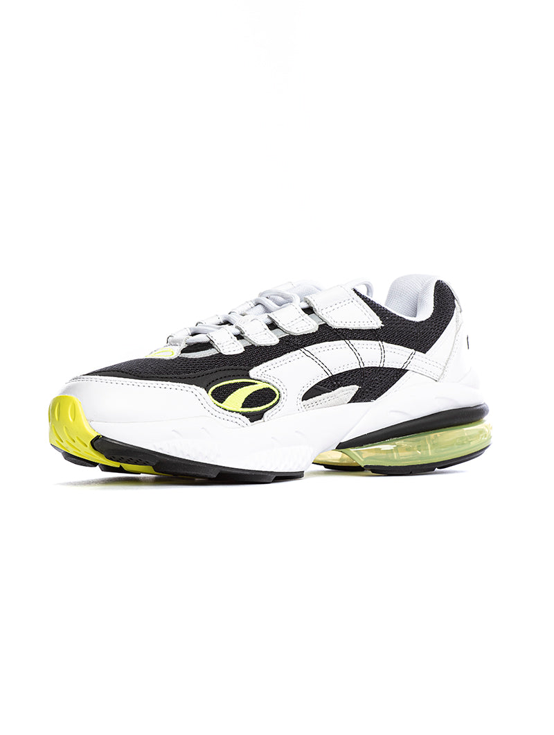 puma yellow and black shoes