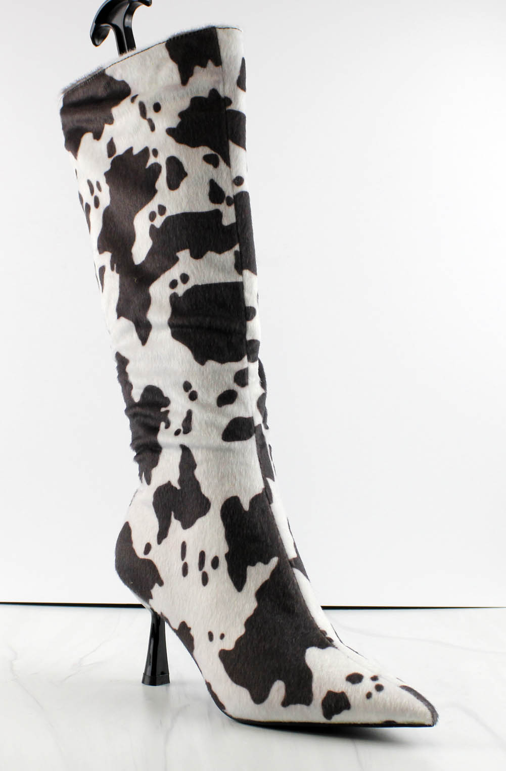 cow print knee high boots