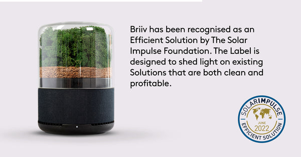 Picture of the Briiv air filter with the Solar Impulse Efficient Solution label and text saying "Briiv has been recognised as an efficient solution by the Solar Impulse Foundation. The label is designed to shed light on existing solutions that are both clean and profitable". 