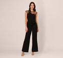 Wide Leg Jumpsuit With Illusion Neck And Cap Sleeves In Black