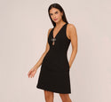 Fit-and-Flare Cocktail Short V Back Fitted Applique Cutout Sleeveless Dress With a Bow(s) and Rhinestones