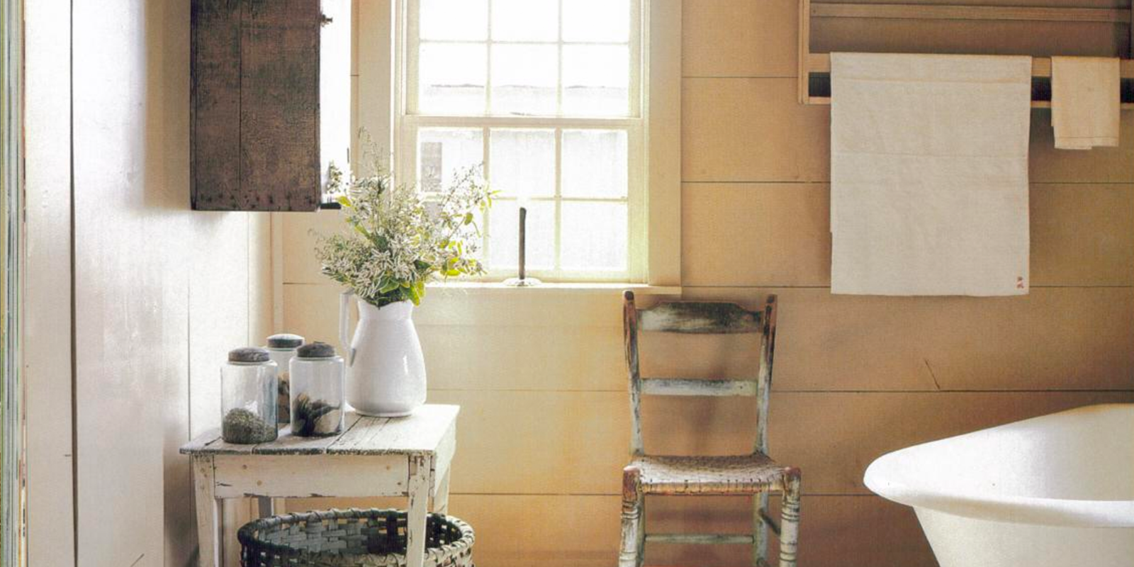 Towel hanging on rack in country setting lifestyle