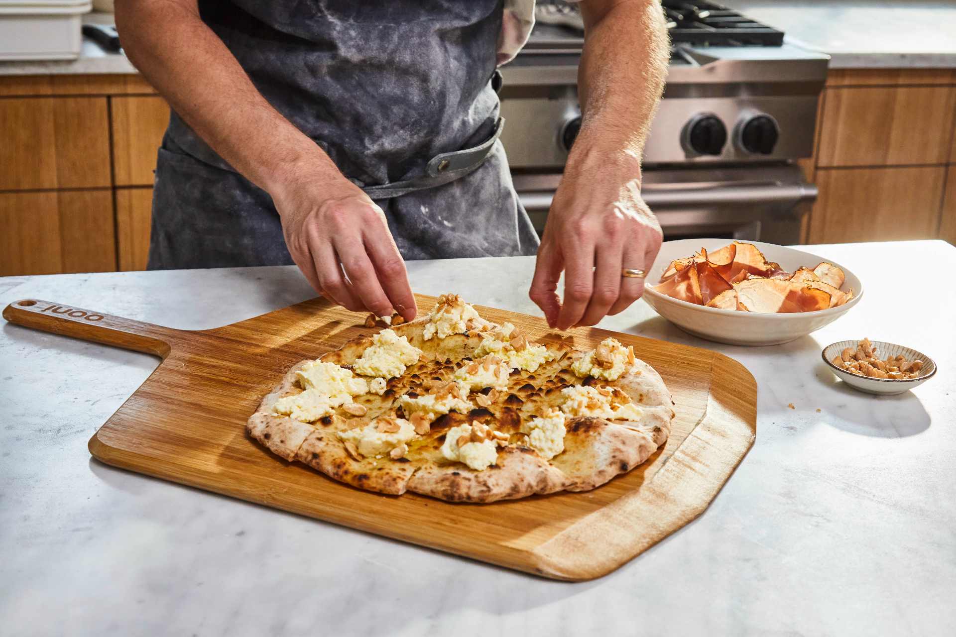 Pizza Crostini with Ricotta, Speck and Marcona Almonds