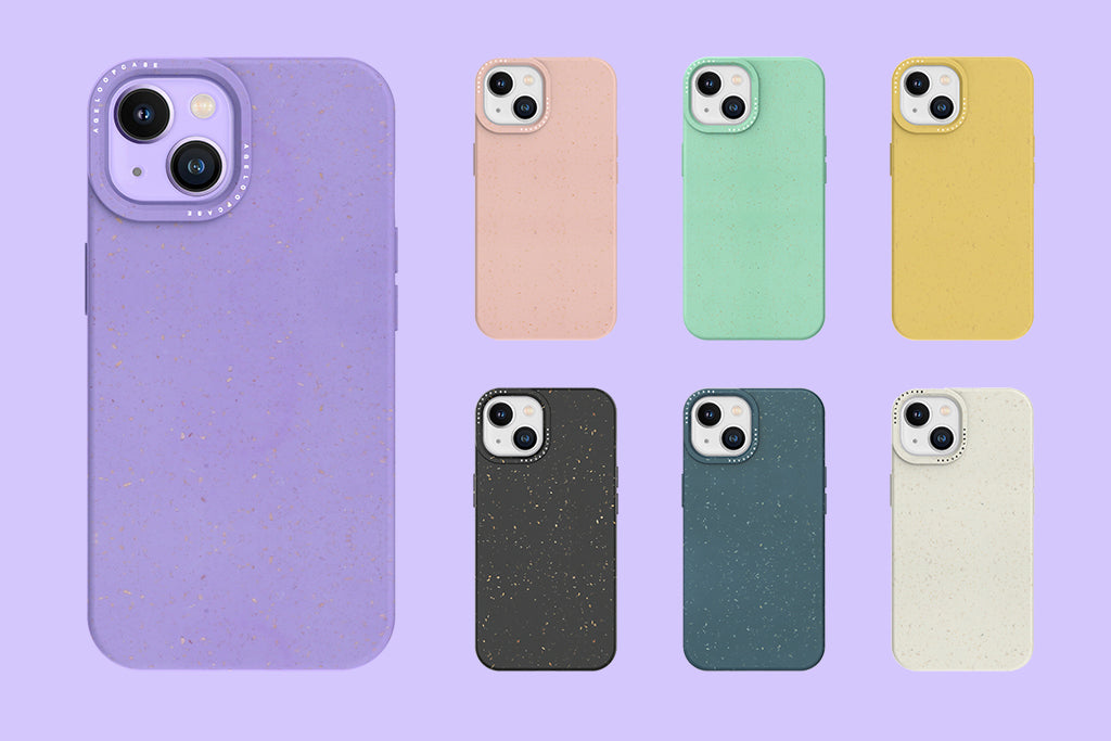 7 colorful iPhone 14 cases on purple background