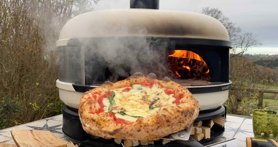 A Neapolitan Margarita pizza coming out of the Gozney Dome