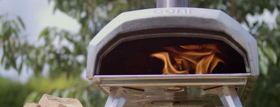 Ooni Karu 12 Pizza Oven with a Wood Fire Burning
