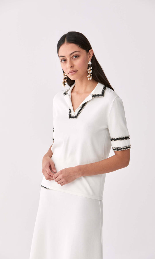 Roman Fringe Trim Polo Shirt. 1