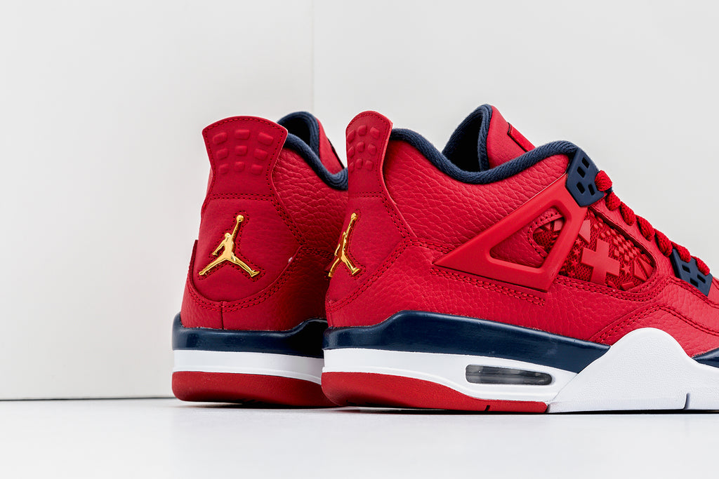 red and gold jordan 4