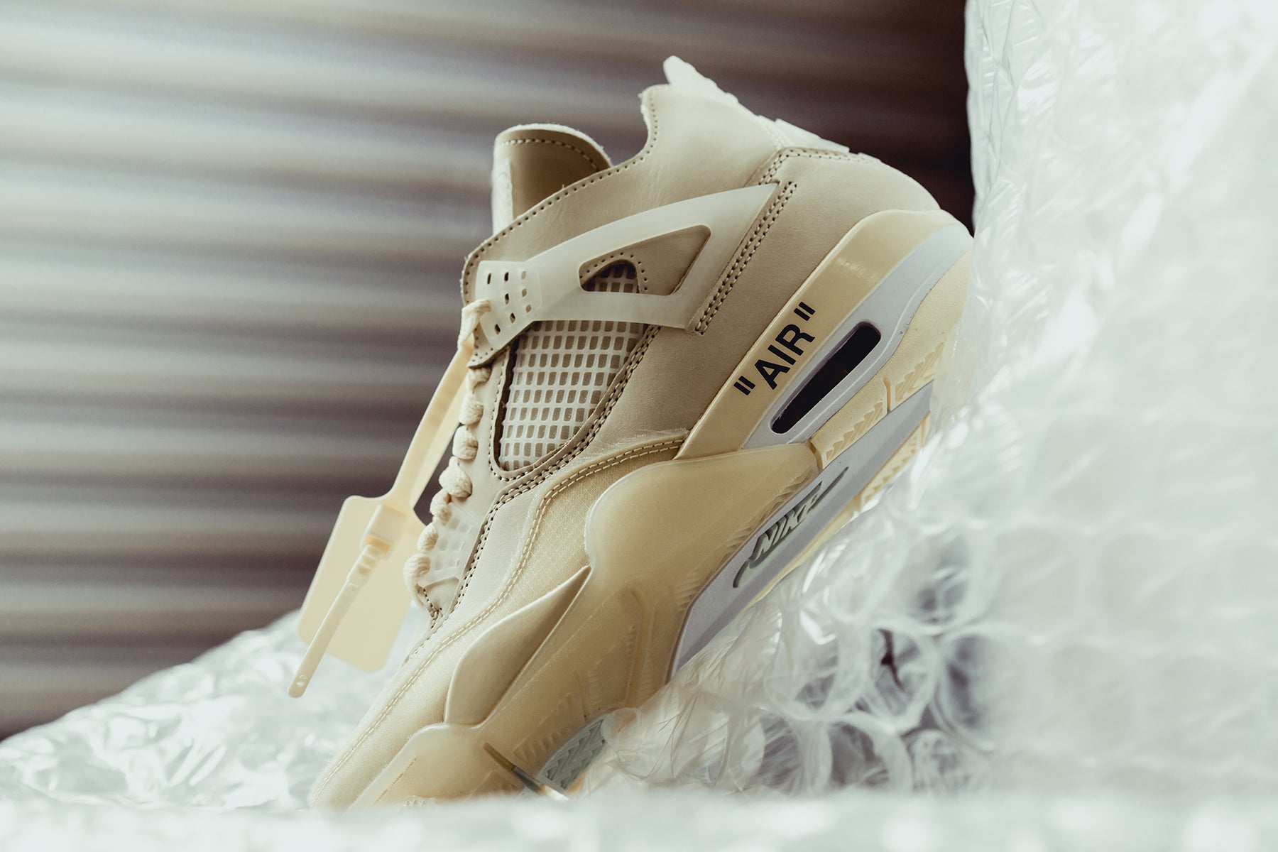 Off-White x Air Jordan 4 'Sail' Releasing July 25th – Feature