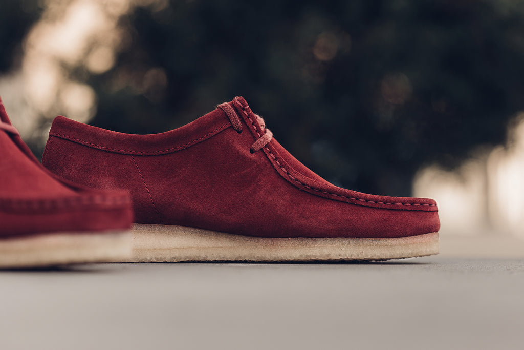 red suede wallabees