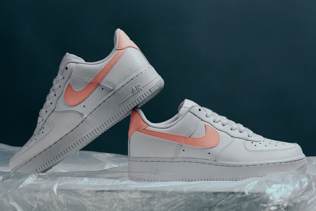 nike air force ones with pink swoosh