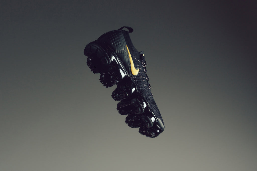 womens black and gold vapormax