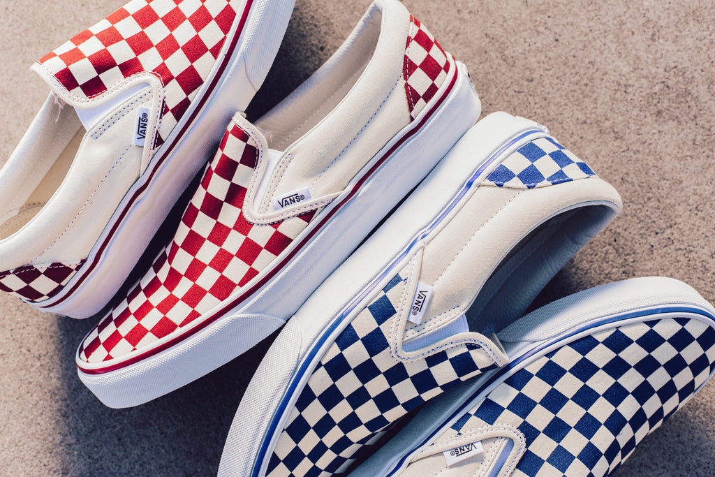 red and blue checkerboard slip on vans