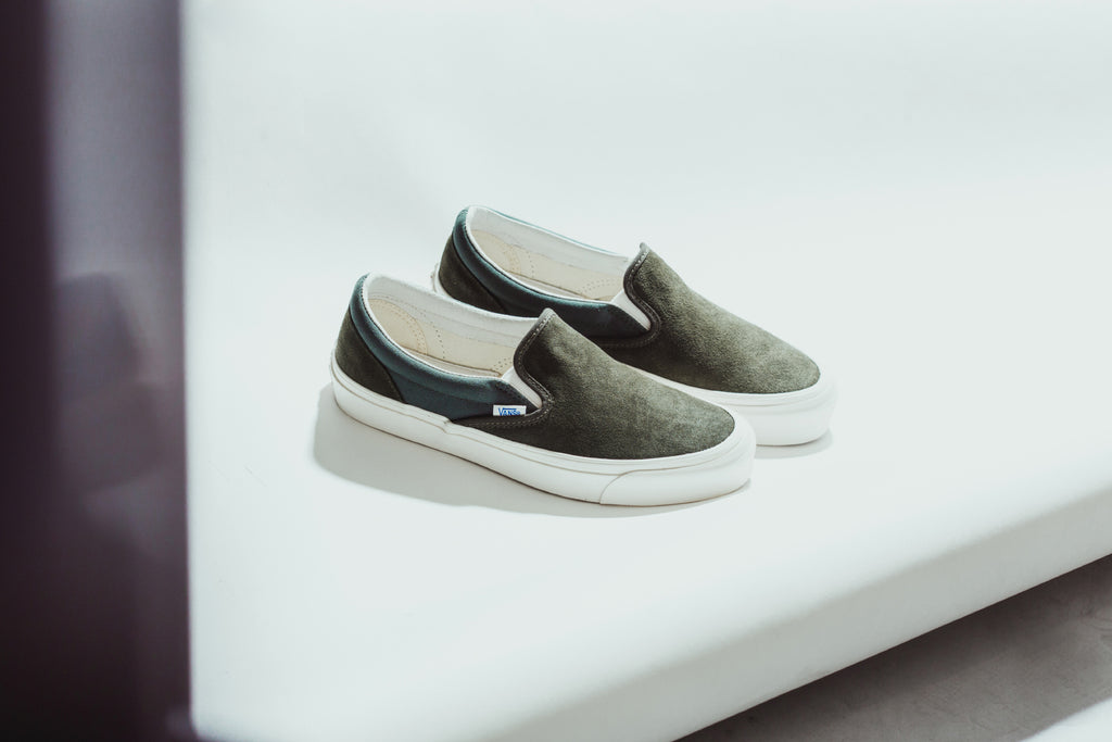 dark green slip on vans