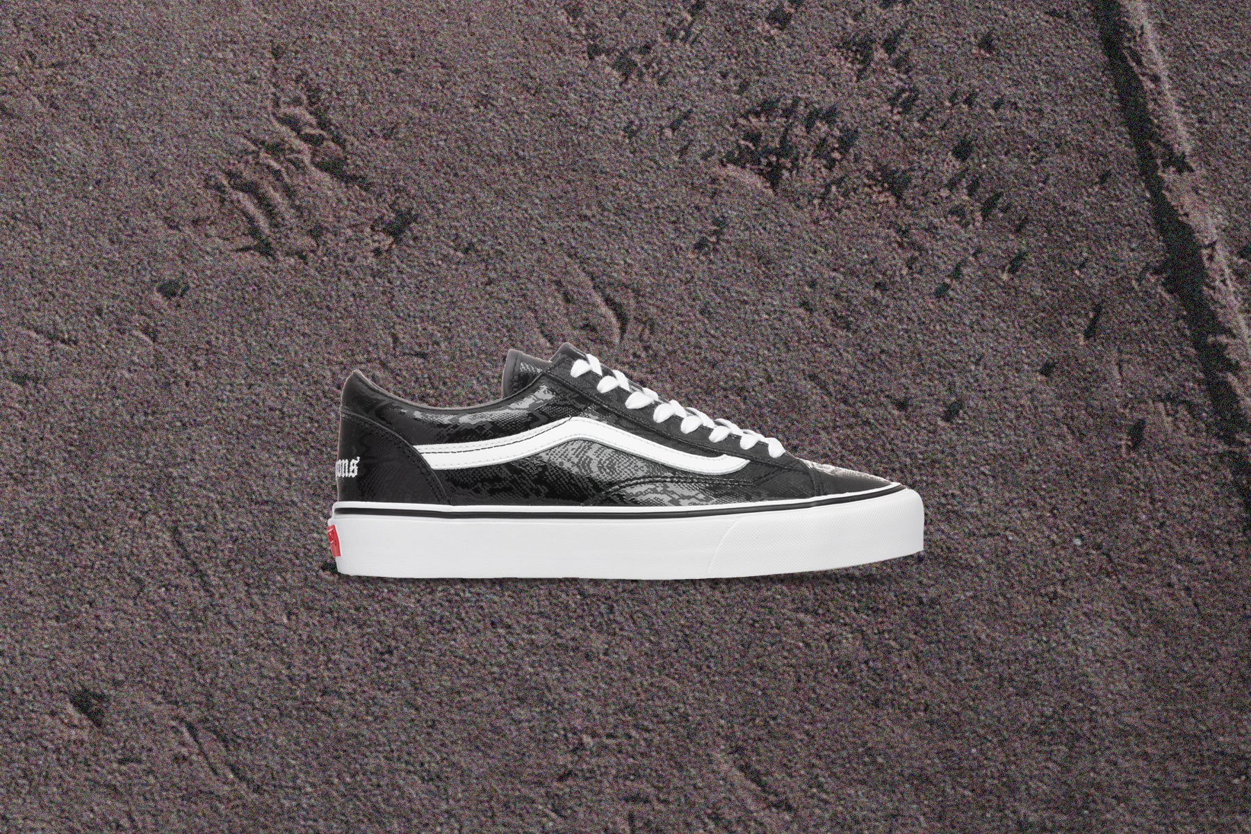 vans snakeskin black