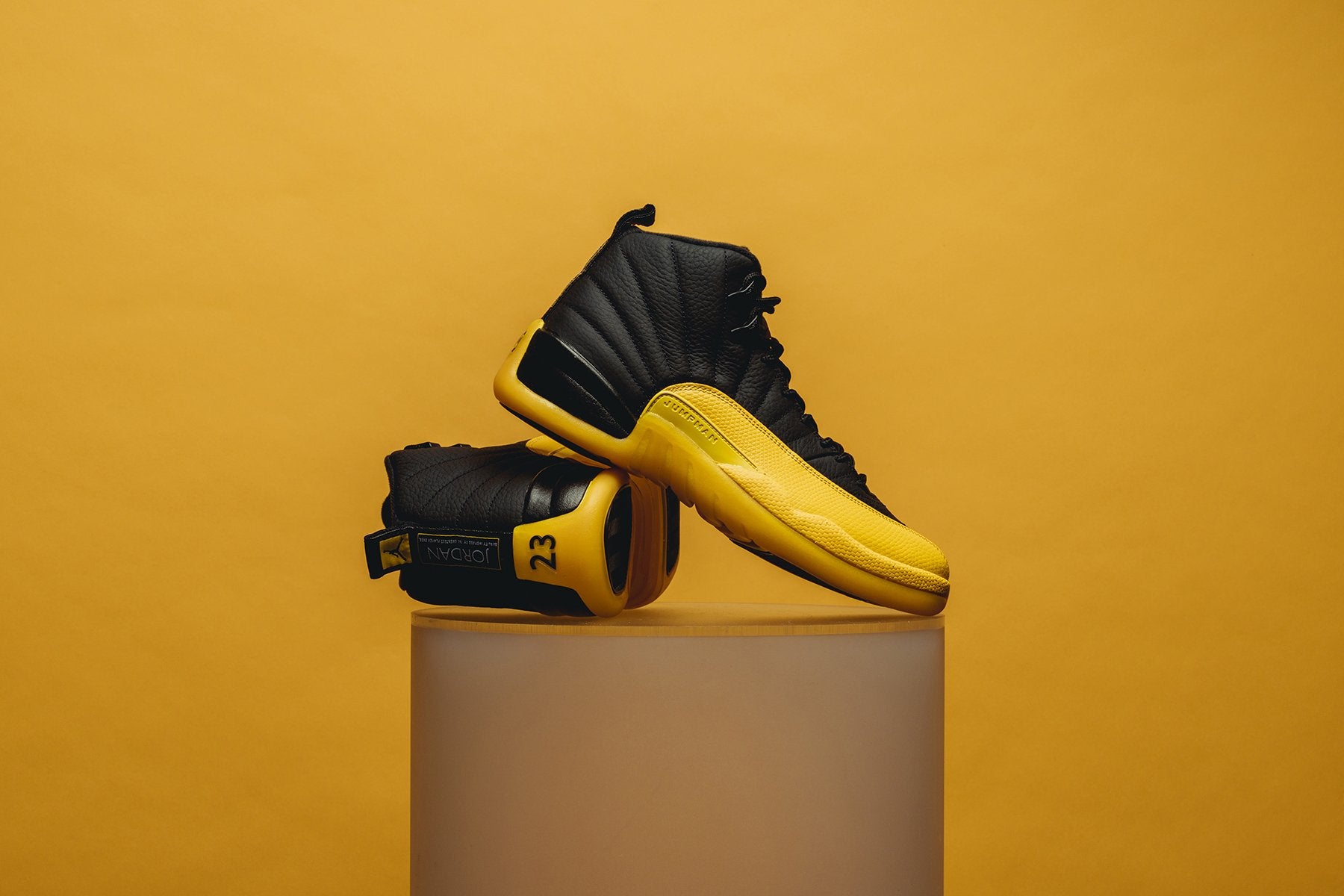 black and university gold jordan 12