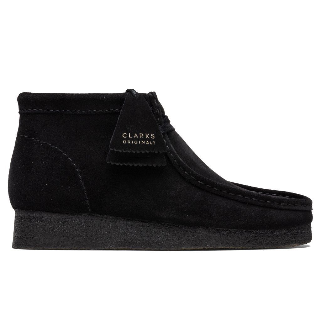black wallabee boots