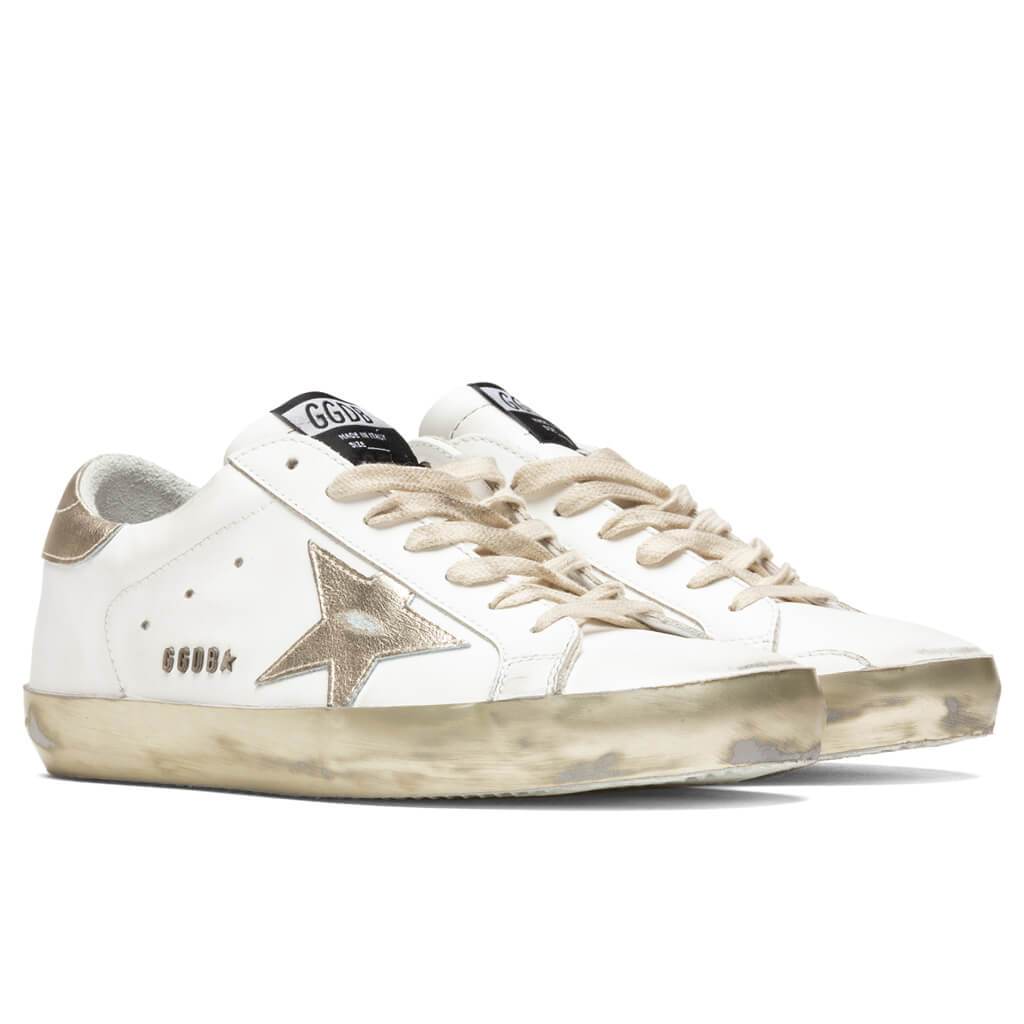 white and gold golden goose sneakers