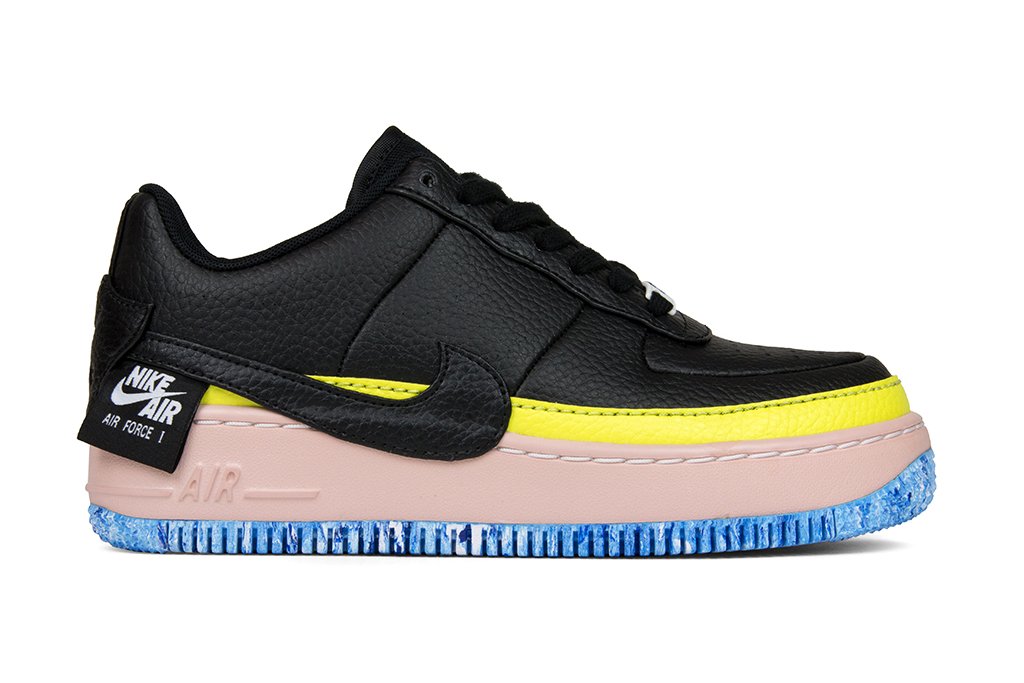 black and yellow nikes womens