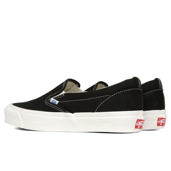 vans slip on vault black