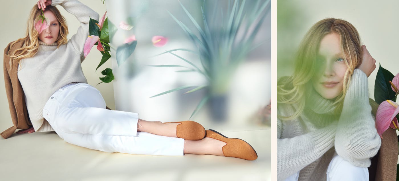 On the left, model lying on floor wearing The Loafer in Fawn. On the right, close up of model leaning against a plant. 