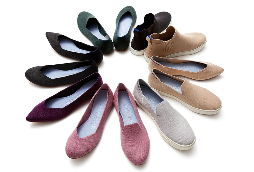 Studio image of Rothy's merino shoes arranged in a circle on a white background.