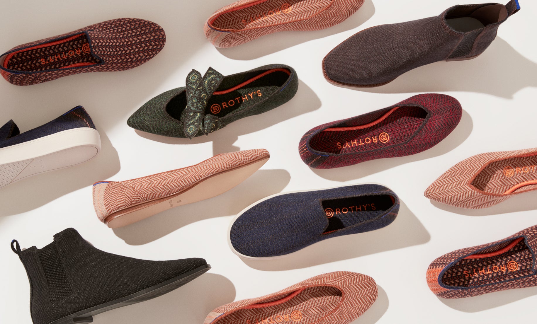 An assortment of Rothy's merino wool shoes, photographed from the top. 