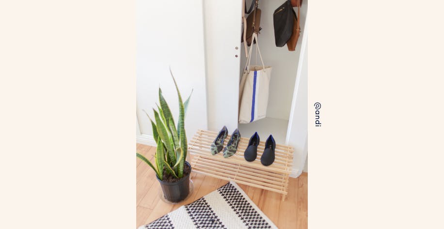 open closet. Photo by instagram user @andi of The Point in Olive Camo and The Loafer in Black atop a wooden shoe shelf, sitting in front of an 