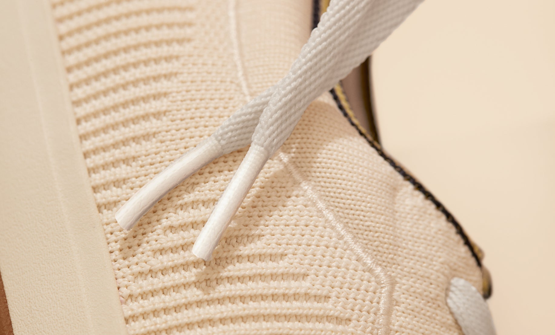  Close up of the side stitching details of The Lace Up in Vanilla.
