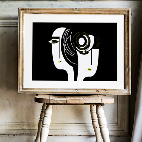 Women's faces in black and white abstract art
