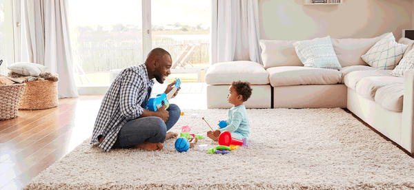 Dad playing with child | Blog From Pollywiggles - South African Online Toy Store
