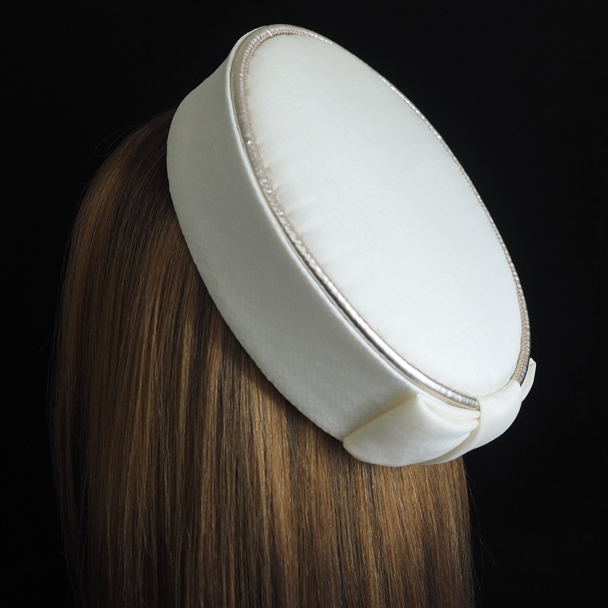 cream pillbox hat